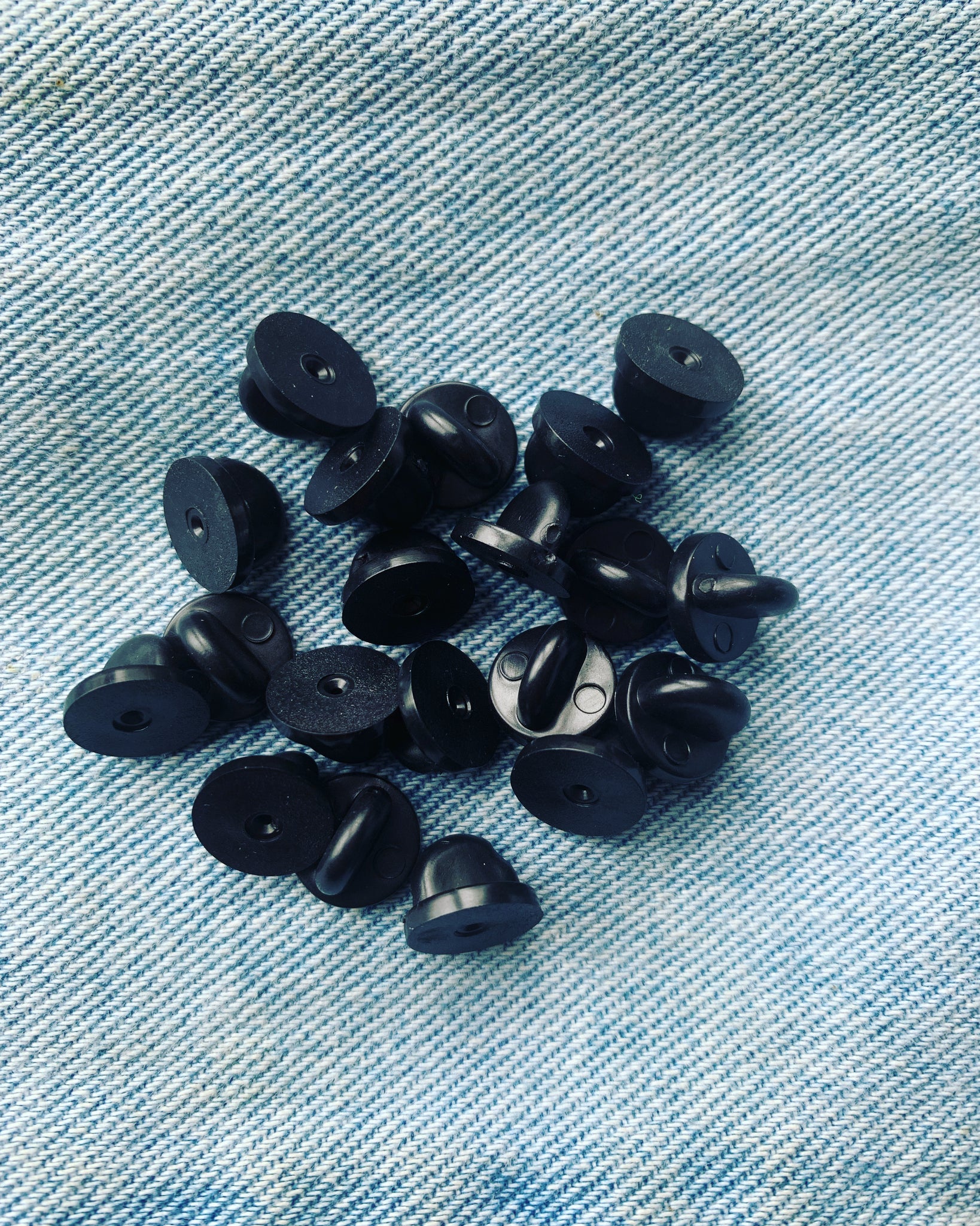 Rubber pin backs